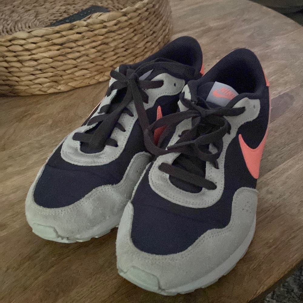 Nike shoes worn a few times. Black, gray and bright orange. Great condition